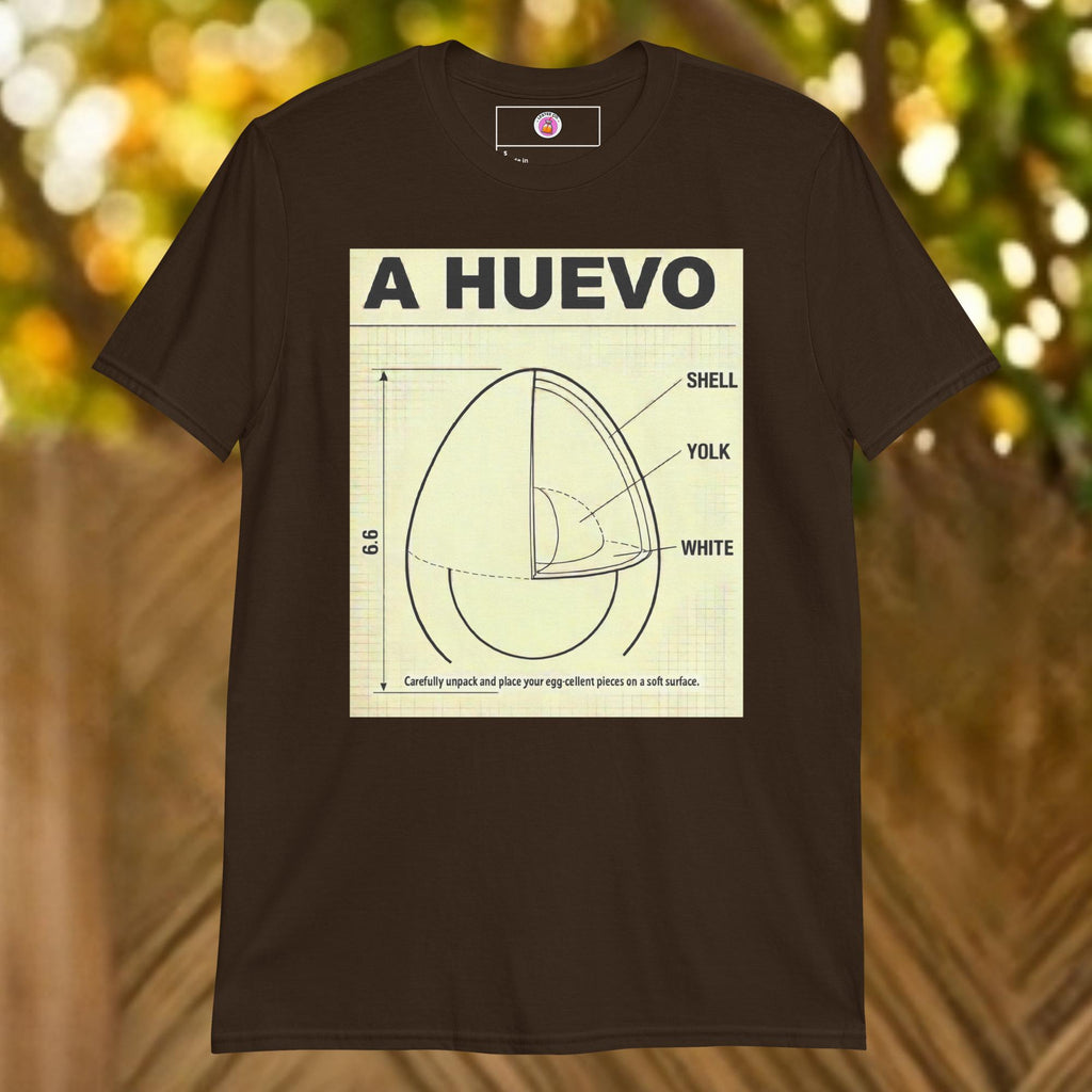 A minimalist Scandinavian furniture instruction manual parody graphic tee showing a technical diagram of an egg labeled "HUEVO" at the top in a bold sans-serif font, blending Latino slang with minimalist furniture instructions.
